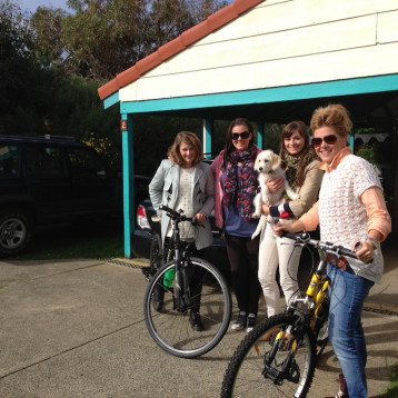 Happy guests after morning cycle-with dog